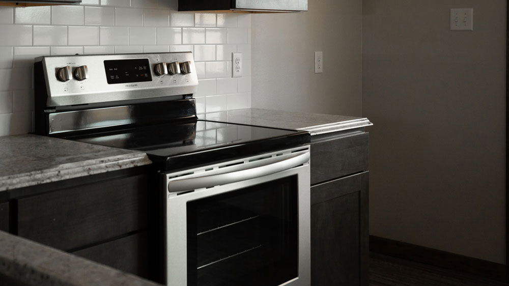 An oven with a flat cooktop